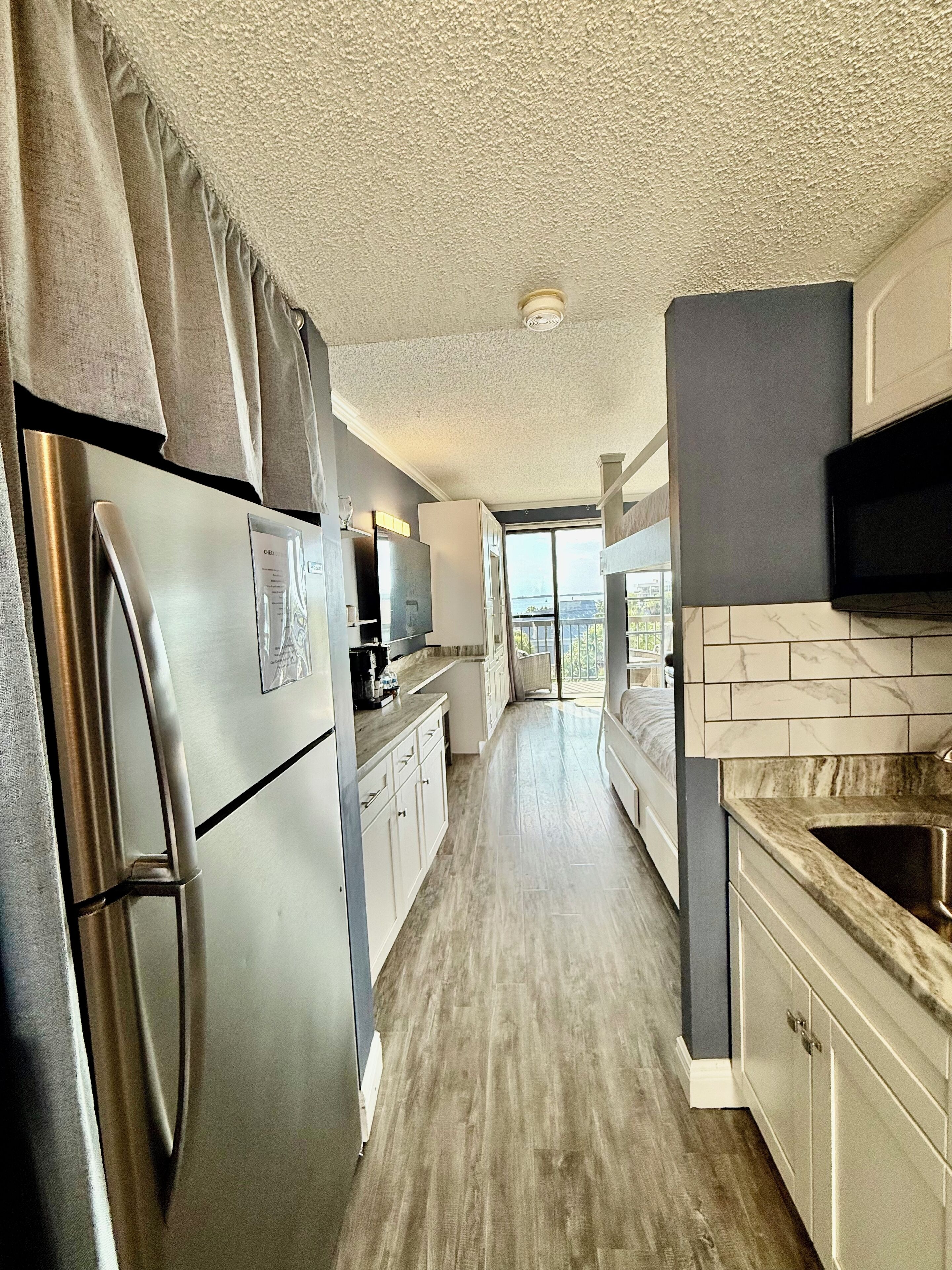 Fridge, microwave, coffee/tea maker, toaster