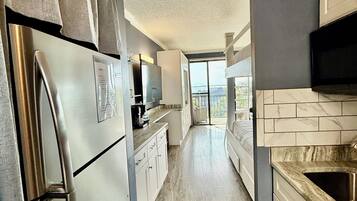 Fridge, microwave, coffee/tea maker, toaster