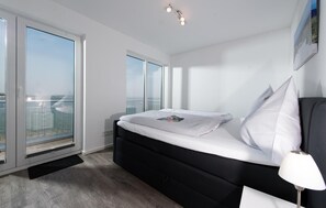 2 slaapkamers, een strijkplank/strijkijzer, reisbedje, gratis wifi