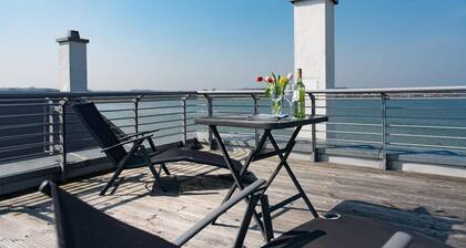 Casa en primera línea de playa en Olpenitz con vistas al mar.