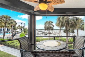 Outdoor dining - Marco Island Waterfront Condo. 2 Pools, River & Dolphin View, Walk to Everything (Marco Island)