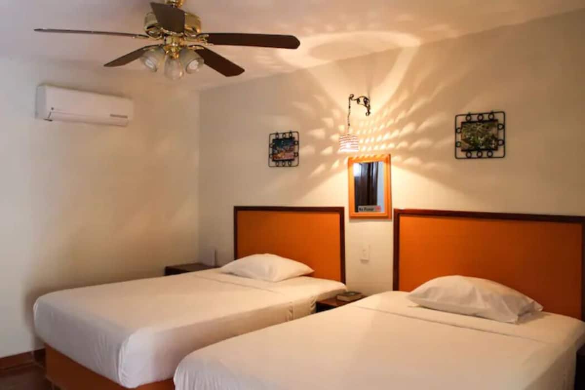 Basic Room, 2 Double Beds, Private Bathroom | Desk, laptop workspace, free WiFi