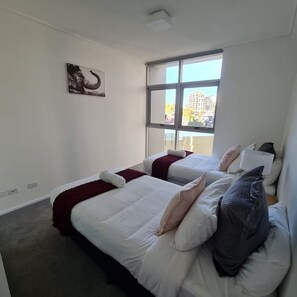 3 bedrooms, desk, iron/ironing board, travel cot