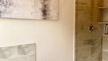 Jetted tub, hair dryer, towels, soap