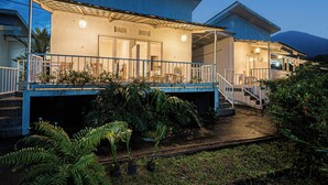 A two-story building with a balcony and a staircase leading to the upper floor. - Santya Loka Lodge & Twin Waterfall (Penebel)