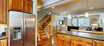 Stunning mountain-view home on Glacier Creek with deck, BBQ, and family friendly