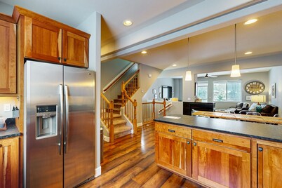 Stunning mountain-view home on Glacier Creek with deck, BBQ, and family friendly