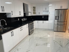 Fridge, microwave, oven, stovetop - White House - 4 Bedroom Home (Whitby)