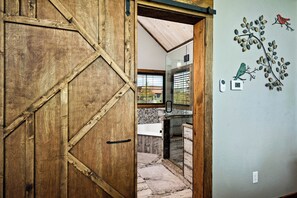 Bathroom | Separate bathtub and shower, hair dryer, towels, soap - Fairway Treehouses (Berryville)