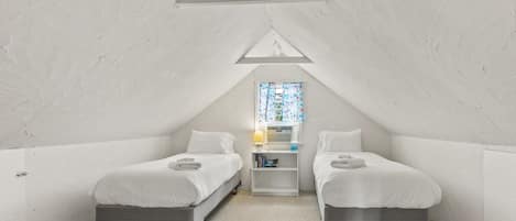 4 slaapkamers, een strijkplank/strijkijzer, wifi, beddengoed
