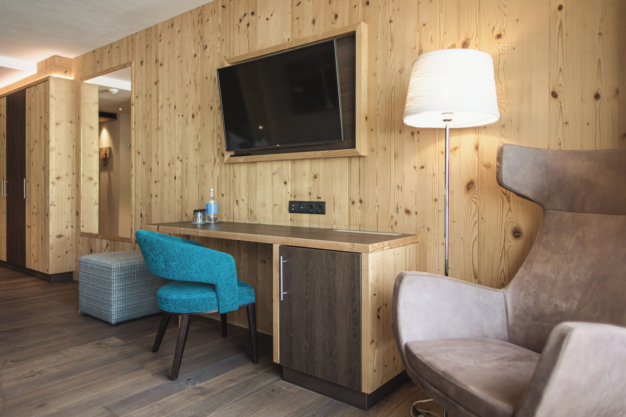 Junior Suite Lifestyle | Minibar, desk, laptop workspace, soundproofing