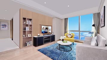 Two-Bedroom Executive | Living area | 42-inch LCD TV with cable channels