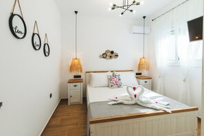 2 slaapkamers, een strijkplank/strijkijzer, gratis wifi, beddengoed