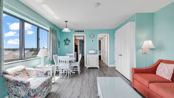 Family Condo, 1 Bedroom, Balcony, Partial Ocean View | In-room dining