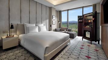 Suite presidencial, 1 cama King size | Ropa de cama de alta calidad y minibar