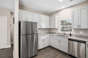 Fridge, microwave, oven, stovetop - Modern New Build 4BR 4BA ( 2 Condos) Garage/Patio (Wyoming)