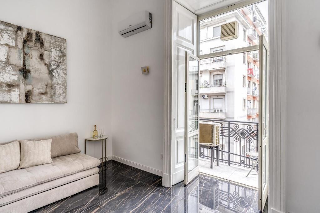 Appartamento Deluxe, 1 letto king con divano letto | Area soggiorno | TV a schermo piatto 48 pollici con canali satellitari, Netflix