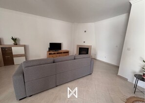 Family House | Living area | 20-inch flat-screen TV with cable channels