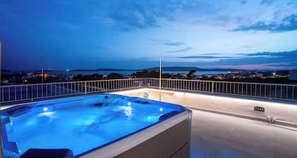 Welcome to your perfect getaway at our stunning rooftop house!