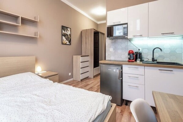 1 habitación, tabla de planchar con plancha, wifi y ropa de cama 