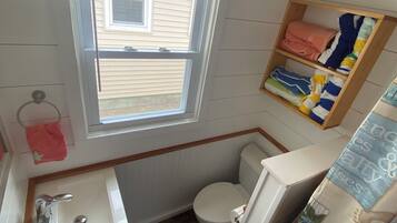 Shower, towels, toilet paper