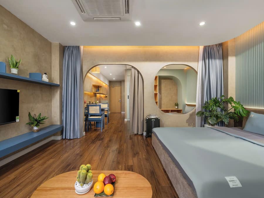 Habitación familiar, varias camas | Área de sala de estar