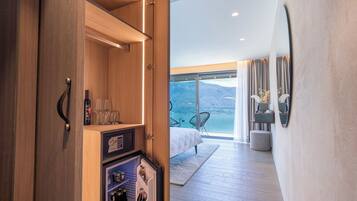 Deluxe Room, Private Bathroom, Lake View | 1 bedroom, minibar, individually decorated, desk