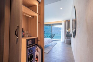 Deluxe Room, Private Bathroom, Lake View | 1 bedroom, minibar, individually decorated, desk