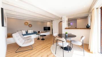 Deluxe Apartment | Living area | Smart TV