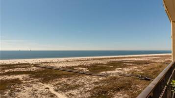 On the beach, sun loungers