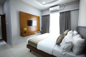 Deluxe kamer | 1 slaapkamer, een bureau, beddengoed