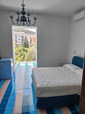 Deluxe Quadruple Room | In-room safe, individually furnished, blackout curtains, free WiFi