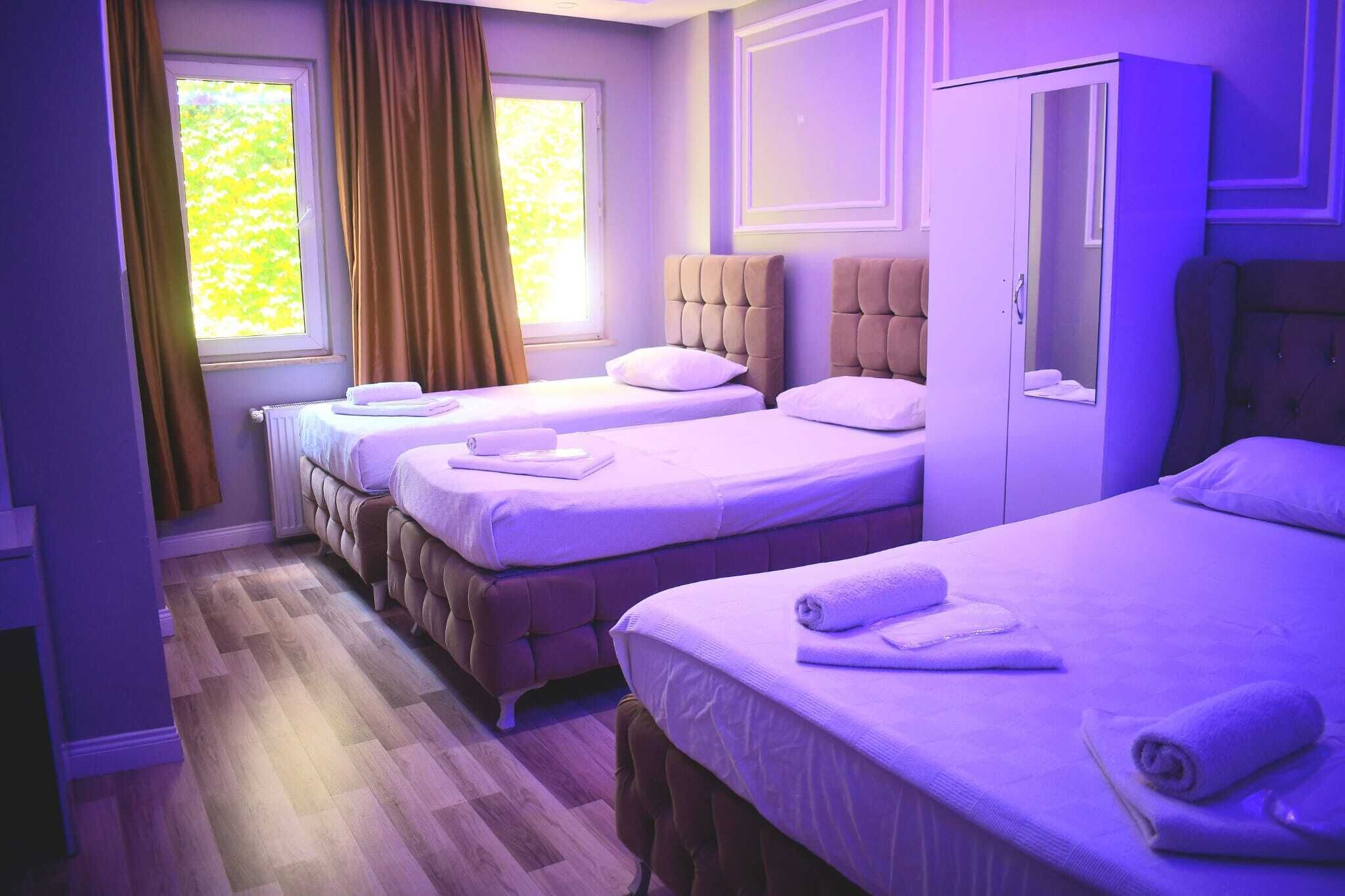 Familienzimmer, Gartenblick | Schreibtisch, laptopgeeigneter Arbeitsplatz, kostenloses WLAN