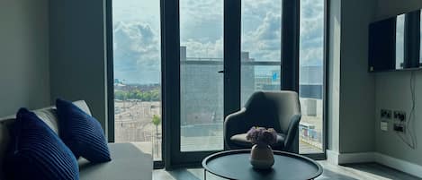 Apartamento elite | Área de estar | TV de tela plana 40 polegadas com canais a cabo