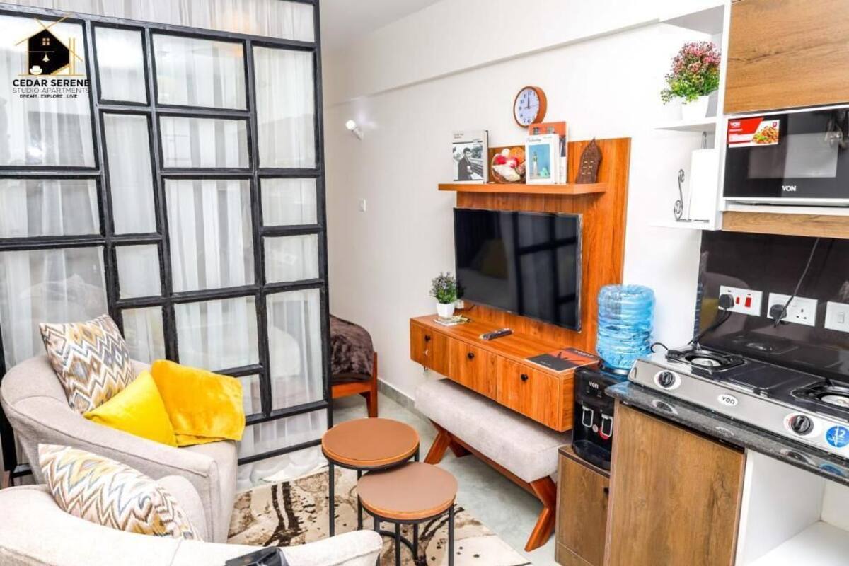 Executive Apartment | Desk, laptop workspace, WiFi (free), individually decorated