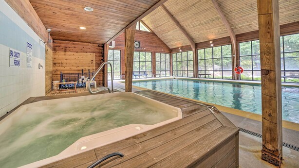 A wooden interior with a hot tub and a pool. - Sapphire Valley Condo w/ Pool & Lake Beach Access! (Cashiers)