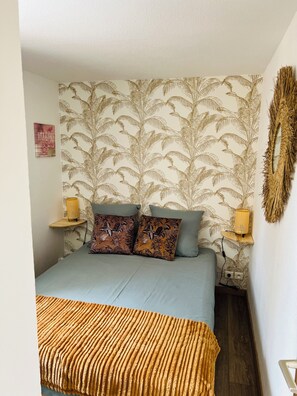 2 dormitorios, tabla de planchar con plancha, wifi y ropa de cama