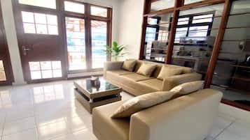 Family Villa, Multiple Bedrooms, Private Pool | Living area | 55-inch Smart TV with cable channels, Netflix, streaming services