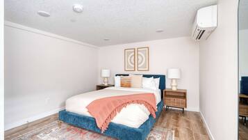 2 habitaciones, tabla de planchar con plancha, cuna de viaje y wifi