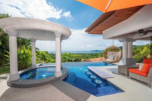 Experience the pinnacle of luxury at Casa del Mar, a stunning 4-bedroom home located in the prestigious Hermosa Heights.