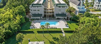 Beachfront Top Floor Condo | Pool | Elevator | Balcony | Beach Gear | Ground-Level Storage