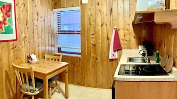 Microwave, stovetop, coffee/tea maker, cookware/dishes/utensils