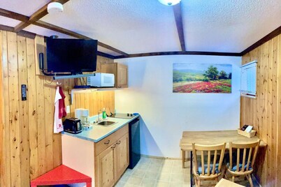 Quaint Riverside Cabin #2