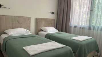 2 bedrooms, desk, WiFi, bed sheets