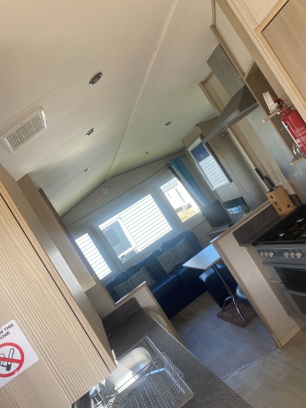 Cabin | Private kitchen | Fridge, microwave, oven, stovetop - Coastal Cabin Retreat in Rhyl (Rhyl)