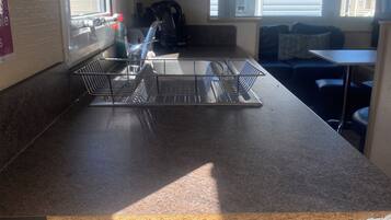 Cabin | Private kitchen | Fridge, microwave, oven, stovetop
