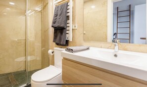Shower, hair dryer, towels, soap