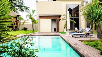 Outdoor pool, pool umbrellas, pool loungers