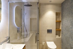 Shower, hair dryer, towels