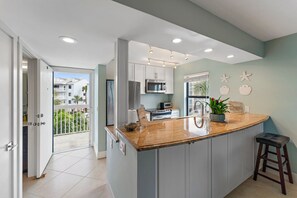 Fridge, microwave, oven, stovetop - Beautiful top floor condo with stunning lake & river views on Hutchison Island (Stuart)